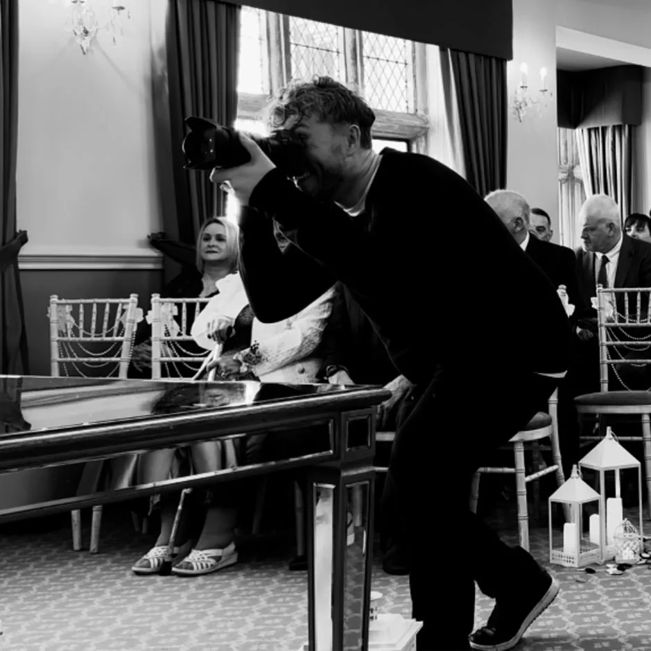 Rob shooting from a low angle beside the guests