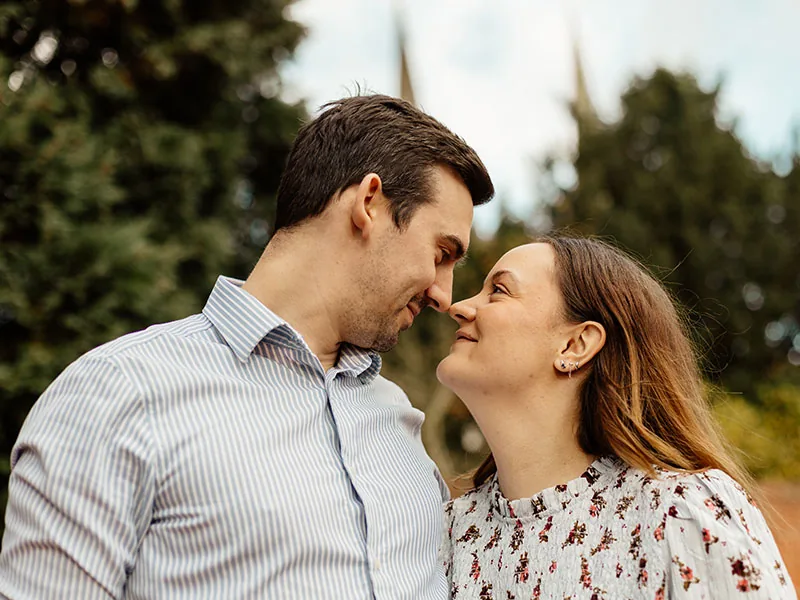 Couple laughing together during a pre-wedding shoot