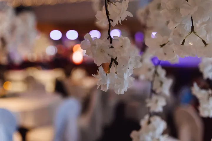 White blossom centrepieces at The Premier Suite