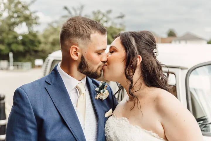 A kiss beside the camper van