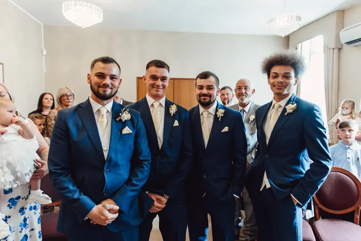 Owen and his groomsmen waiting at the front
