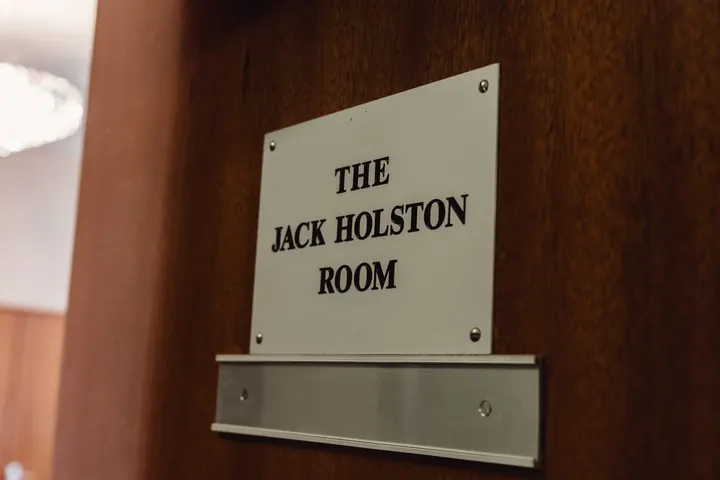 The sign for the Jack Holston Room