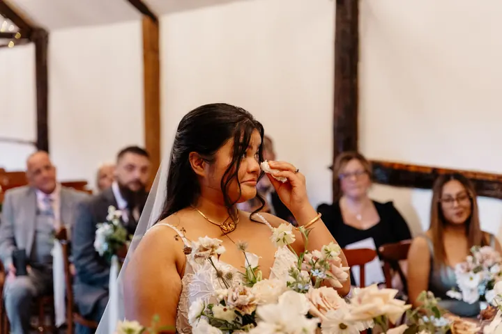 Gloria wiping away a happy tear