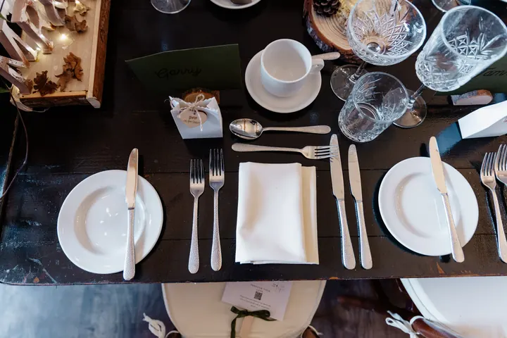 A place setting on a dark wooden table
