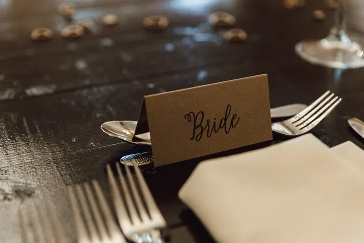 A Bride place card on the top table