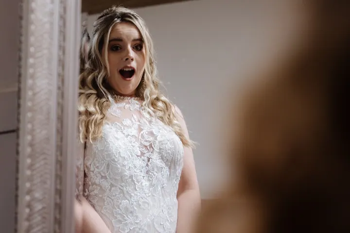 Natasha&rsquo;s delighted reaction in her wedding dress