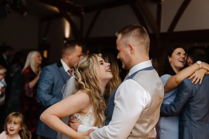 Natasha and Ryan laughing during their first dance