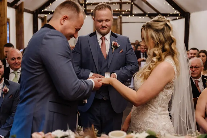 Ryan placing the ring on Natasha&rsquo;s finger