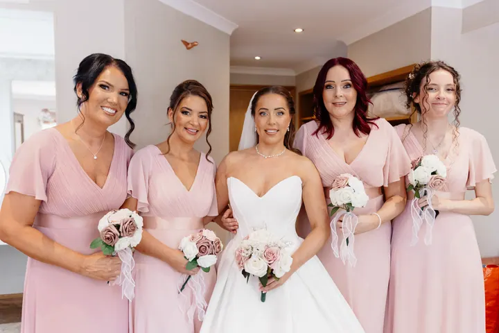 Hayley with her bridesmaids in blush pink