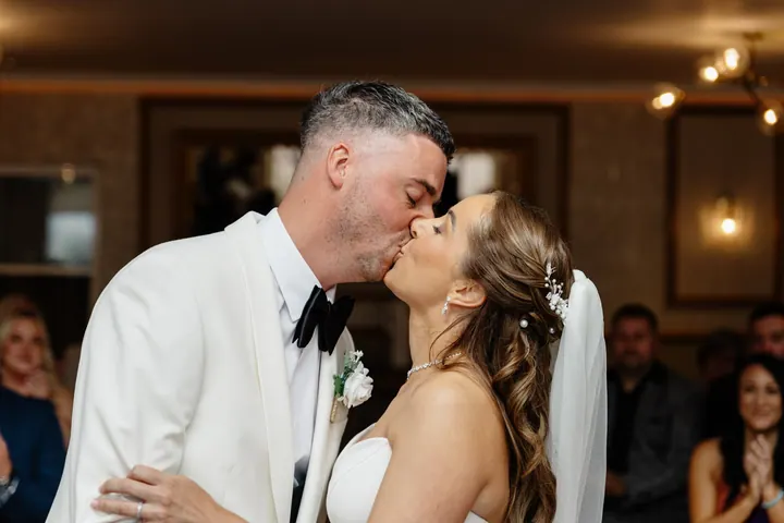 The first kiss in front of the guests