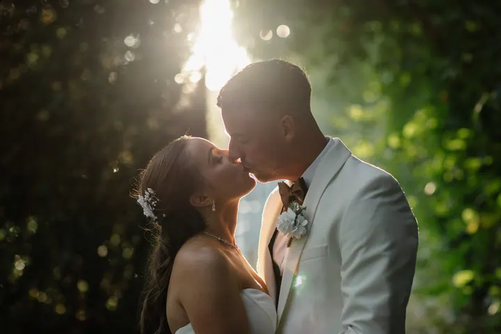 A backlit kiss in golden hour light
