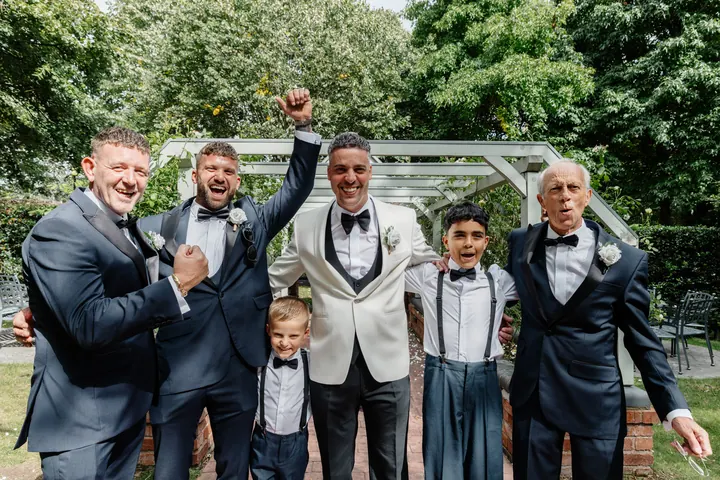 Marco with his groomsmen and page boys