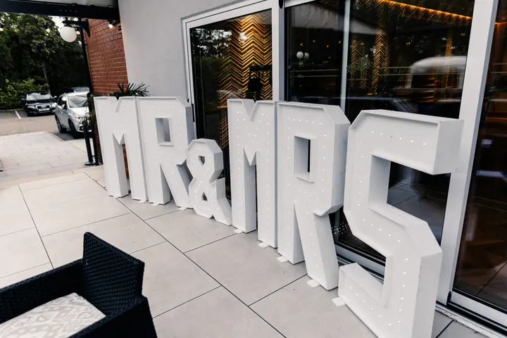 Giant light-up MR & MRS letters on the terrace