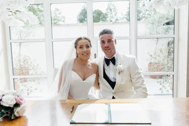 Signing the register by the big windows