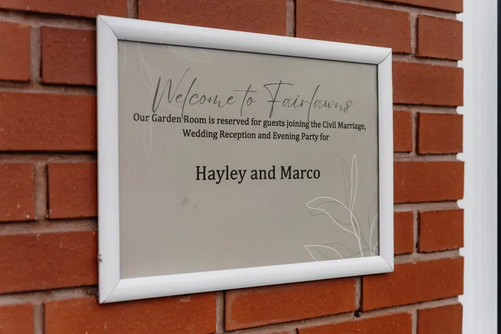 A Welcome to Fairlawns sign for Hayley and Marco