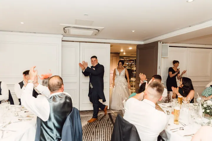 Harry and Hannah making their entrance into the wedding breakfast