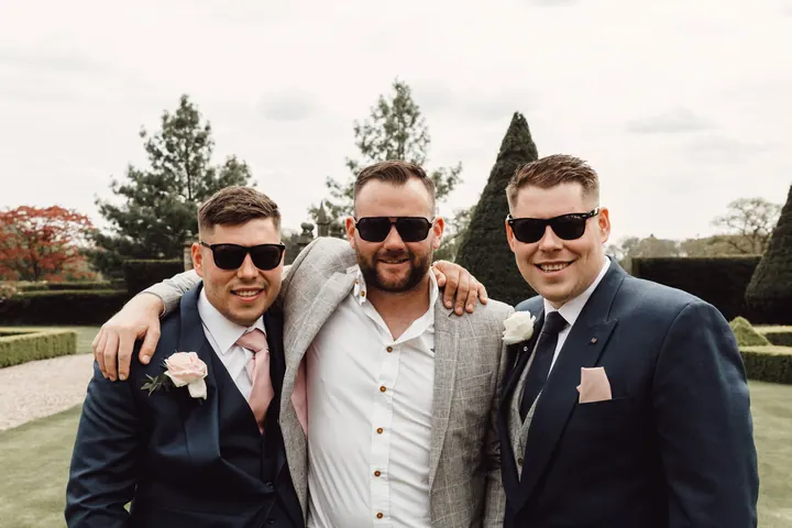 Harry and his groomsmen in sunglasses