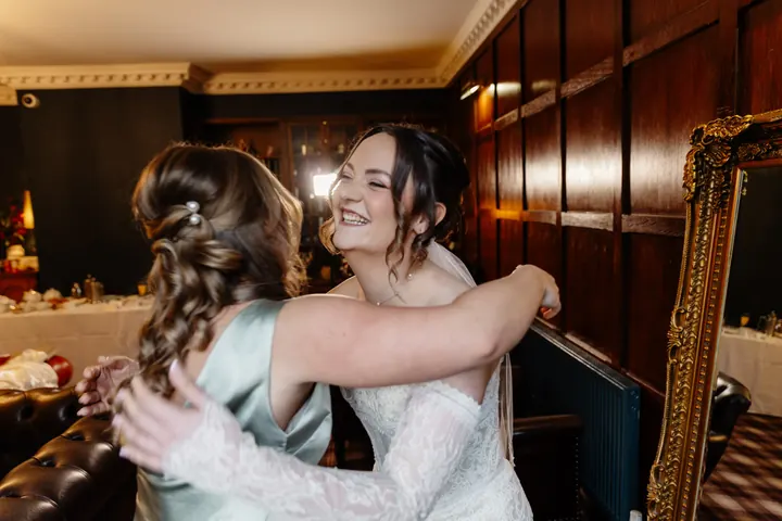Sam sharing a hug before the ceremony