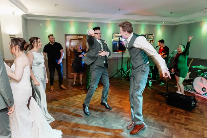 Guests dancing on the parquet dancefloor