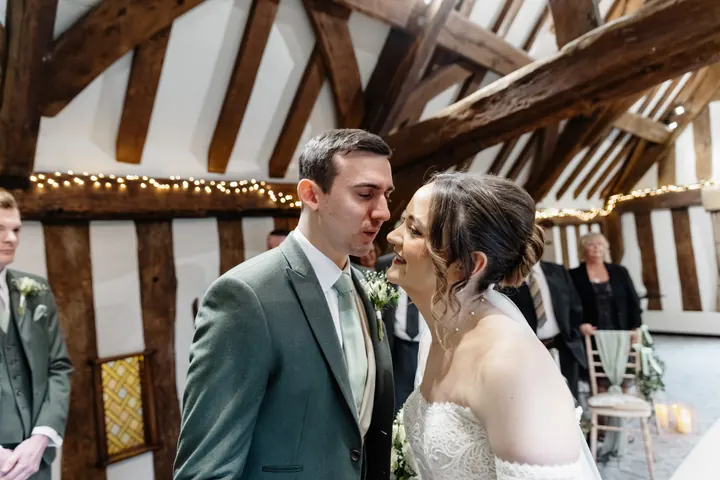 Andrew seeing Sam at the top of the aisle