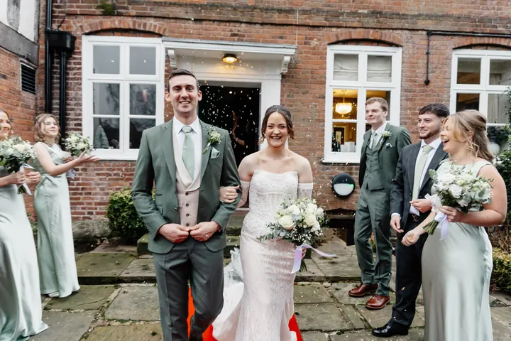 Sam and Andrew stepping out as newlyweds onto a red carpet