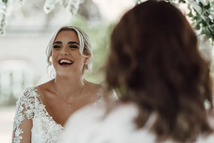 Sarah laughing during the ceremony