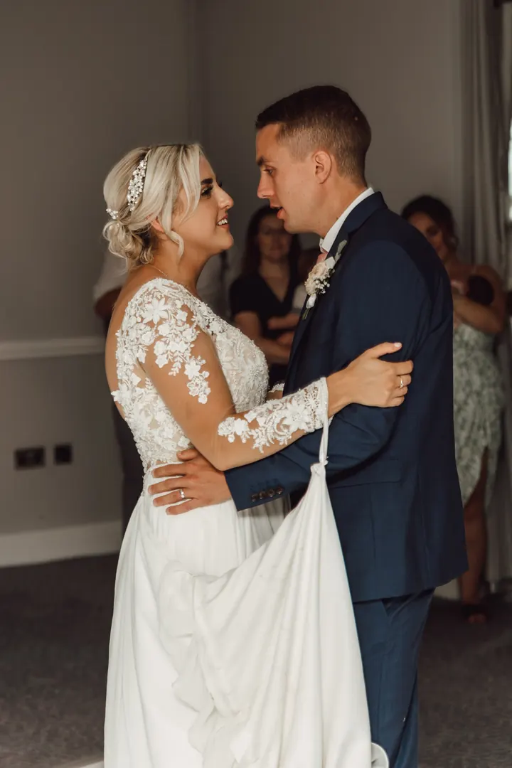 Sarah and Sam close together during their first dance