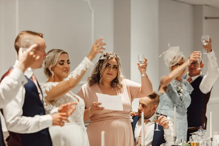Glasses raised for a toast
