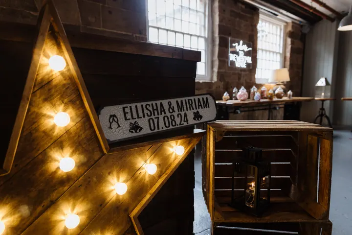 A light-up star and a personalised Ellisha & Miriam sign