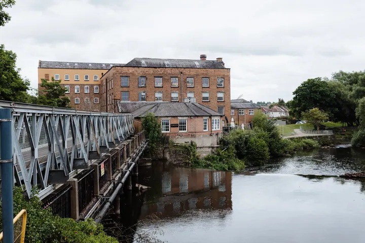 The River Derwent and the old mill buildings at Darley Abbey, Derby