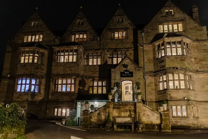 Weston Hall lit up at night